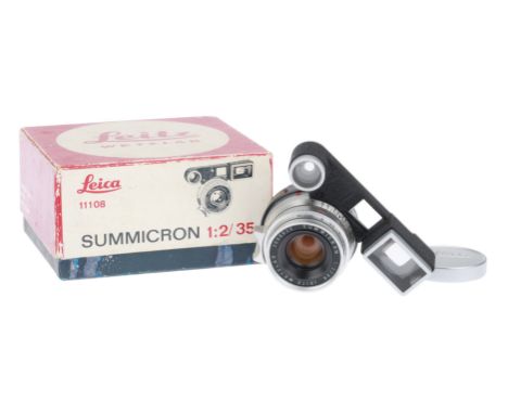 with ocular attachment, chrome, serial no. 2098029, body, VG, elements, VG, some very light internal haze, complete with lens