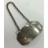 A good Georgian silver wine label of shaped form for 'Gin'.