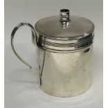 A George III silver wax jack with lift-off cover.