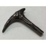A rare 19th Century American mixed metals walking stick handle.