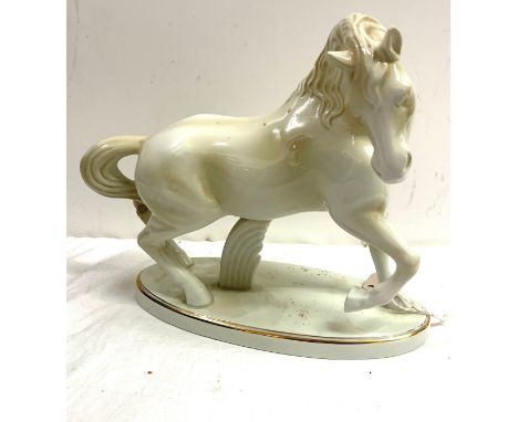 Midehamiga white glazed ceramic horse figure measures approx 11 inches tall and 12 inches wide overall good condition 