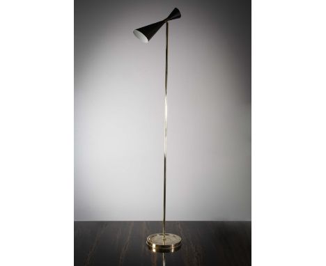 A TALL UPRIGHT FLOOR LIGHT, ITALIAN, 1960s, the adjustable tapering shade on a tubular brass support, circular base, 174cm (h