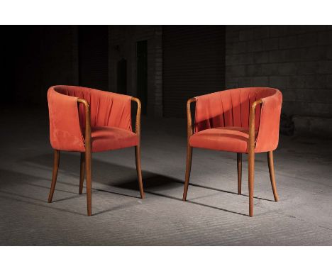 A PAIR OF ITALIAN TUB CHAIRS, ATTRIBUTED TO GIORGETTI, MILAN, with characteristic ‘walking stick’ arms, on tapering legs.  