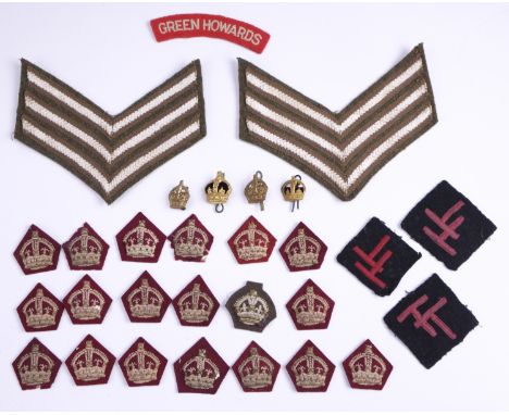 Three  50th (Northumbrian) Division formation signs, a Green Howards shoulder title and army cloth and other rank insignia