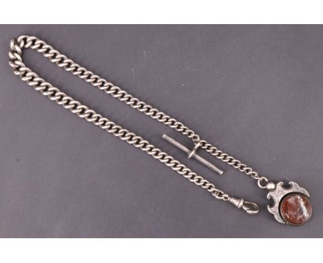 A late 19th / early 20th Century silver graduated curb link watch chain with fancy swivel fob seal, the latter having vacant 
