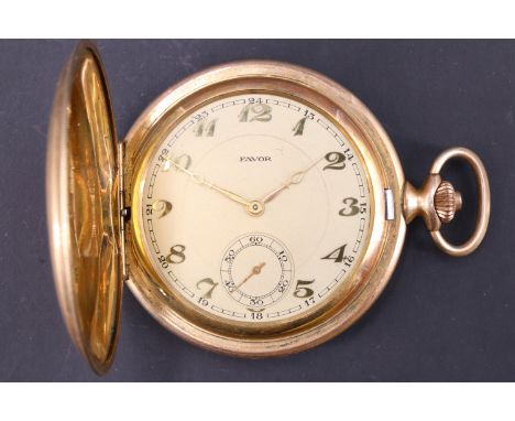An Art Deco gold-plated Favor hunter pocket watch, having a crown wound movement, champagne dial, gilt Arabic numerals and a 