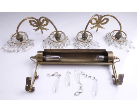 A pair of mid-to-late 20th Century brass two arm wall sconce, having prismatic glass drops (one lacking), together with a bra