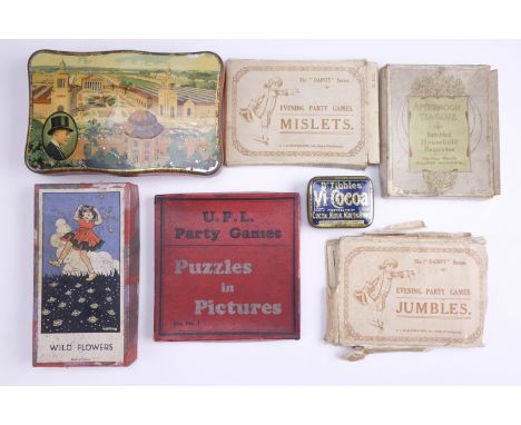 A group of early 20th Century party games together with a North East Coast Exhibition (Newcastle On Tyne) 1929 fob medallion 
