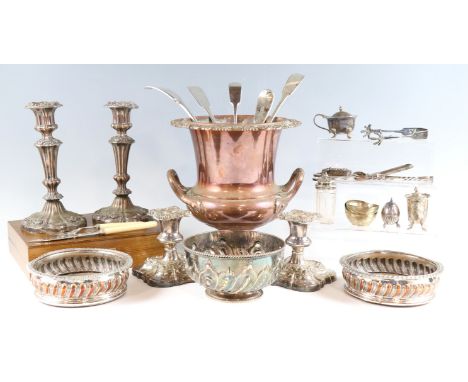 A quantity of Victorian and later silver plate, including a pair of Sheffield plate decanter coasters, candlesticks, wine coo