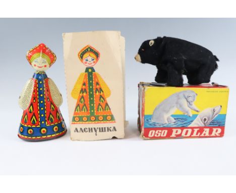 Two boxed vintage clockwork tinplate toys, comprising a Russian doll and a Spanish walking bear, bear 13 cm long, [both worki