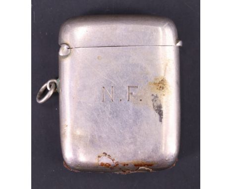 A 1920s silver watch chain fob vesta case, of cushion form bearing engraved initials, 5 cm x 4 cm