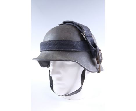 A German Third Reich Luftwaffe M 40 single-decal steel helmet, the shell stamped Q64, with bread bag strap camouflage band