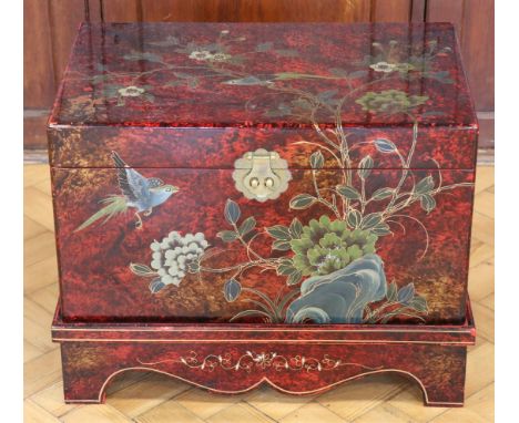 A mid-to-late 20th Century Chinese brass mounted lacquered trunk on stand, 52 x 22 x 55 cm