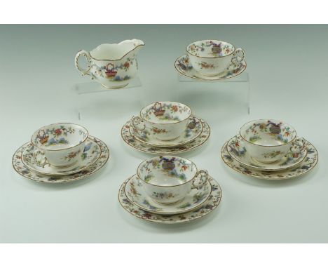 A group of early 20th Century Royal Worcester Pekin pattern tea ware comprising 5 cups, 5 saucers, 4 tea plates and a milk ju