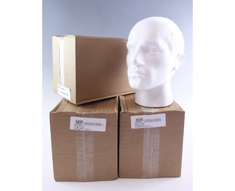 Three new-old-stock polystyrene display mannequin heads, boxed
