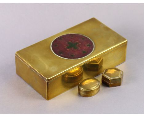 A brass rectangular cigarette box inset with an enamelled roundel to the hinged lift-lid, signed to base “T. Marshall”, 7¾” w