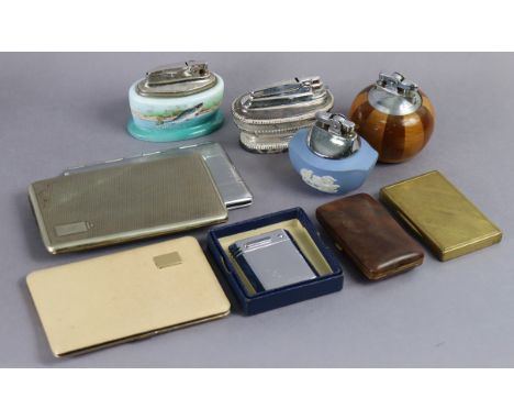 A Magna chrome-plated cigarette lighter, boxed; together with four desk lighters; &amp; five various cigarette cases.