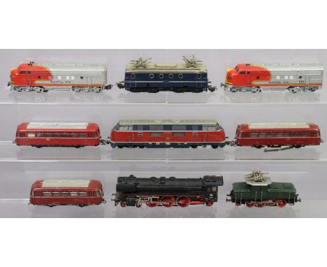 A vintage Marklin “00” gauge (three-rail), scale model of a 4-6-2. locomotive (no 01 097); two ditto scale model Santa Fe die