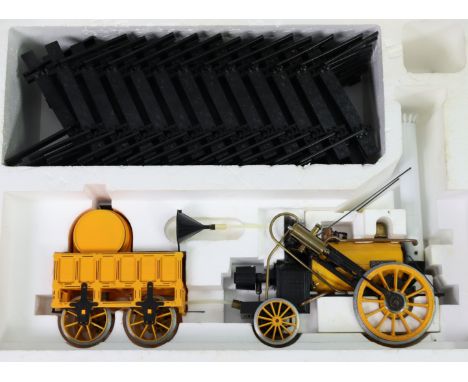 A Hornby railways “Stephenson’s Rocket” Real Steam Train Set (3½” inch gauge model); &amp; a ditto set of railway track (G102