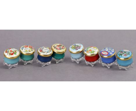 Ten Halcyon Days miniature enamel boxes each with a different romantic message and floral/stylized decoration.
