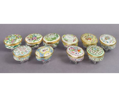 Ten Halcyon Days enamel boxes with floral decoration, each commemorating a different year.
