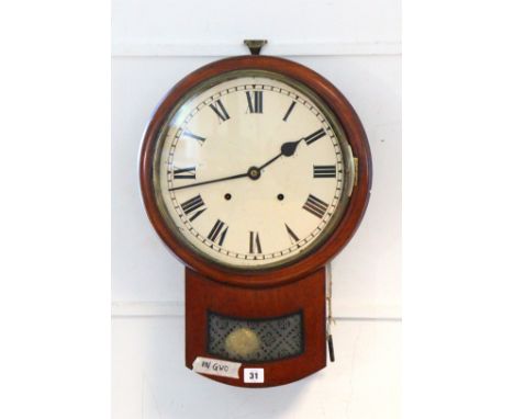 A late 19th/early 20th century drop-dial wall clock with black Roman numerals to the white enamel dial, &amp; in a mahogany c