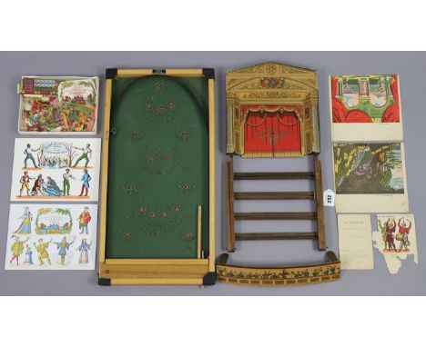 A vintage “Pollocks” puppet theatre with numerous accessories; &amp; a Kay of London bagatelle board, boxed. 