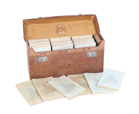 ATTRIBUTED EARLY 20TH CENTURY CASED SET OF MOTORING MAPS. Early 20th Century Leather Cased Set of Bartholomew's Motoring Maps