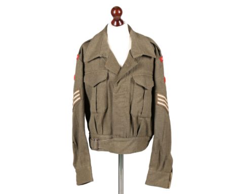 WW2 BRITISH BATTLEDRESS BLOUSE. A Second World War Australian made Battledress Blouse to the Suffolk Regiment, embroidered Su