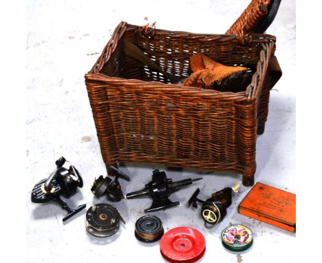 A Wicker Fishing Creel Containing Various Vintage Reels to include Bakelite  Cased Penn No 78, Small