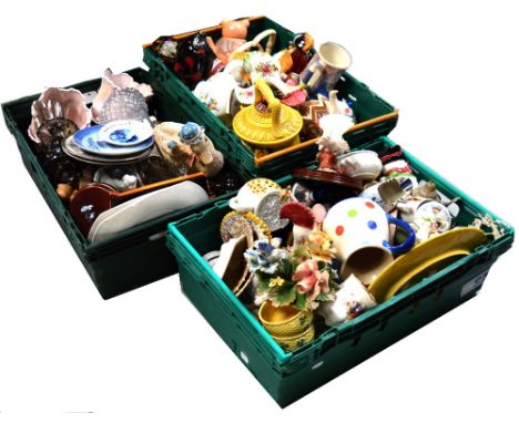 A quantity of decorative ceramics and glassware to include ornamental teapots, decorative figures, a glass decanter etc.
