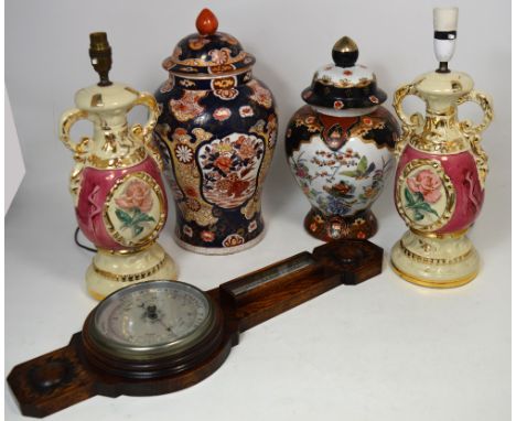 A carved oak aneroid wall barometer, height 63cm, a pair of modern ceramic table lamps and two further Oriental style vases (