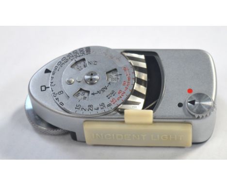 A boxed Leica-Meter MC light meter.