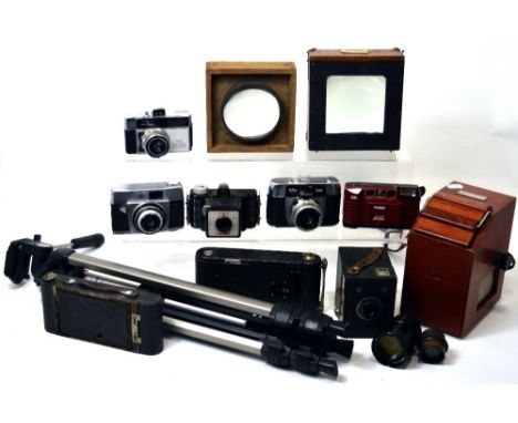 A collection of photographic equipment and accessories to include a boxed Bell and Howell 16mm projection lens, a Johnson Exa