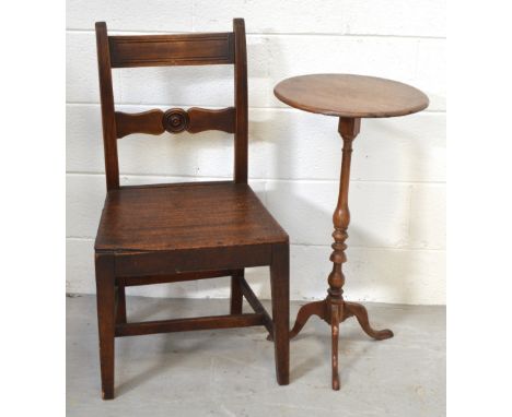 A 19th century Welsh oak hall chair with shaped carved central back support on tapering legs and stretcher and an oak round s