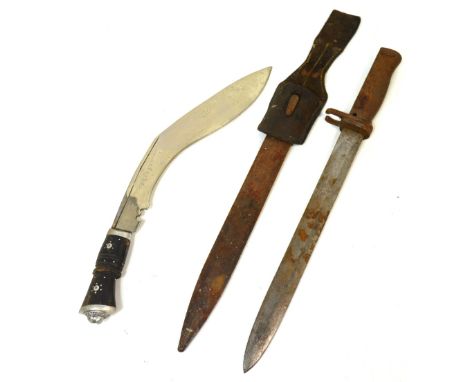 A WWI bayonet with metal scabbard and leather frog and a Kukri knife (2).