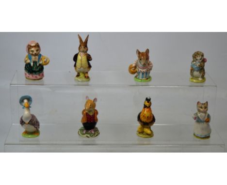 Beswick; a collection of seven handpainted ceramic figures from the Beatrix Potter collection, each with brown stamp to base.