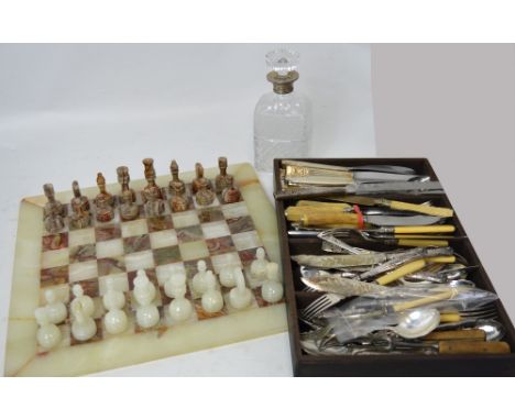 A silver mounted cut glass decanter with stopper, a selection of silver handled flatware, silver plated flatware etc and a bo