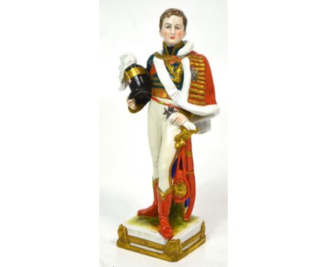 A Continental ceramic figure of a military officer in dress uniform, impress marks to the base 'N E A Paris le 20 Mars 1811',