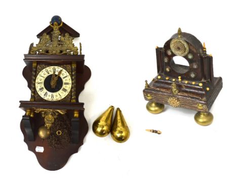 A reproduction mahogany chain driven wall clock, with brass details and attachments and a Middle Eastern style pocket watch s