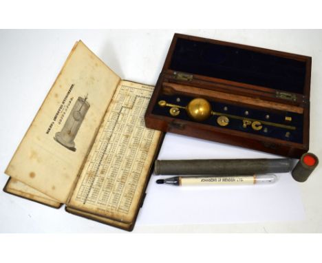 A cased Standard Sykes hydrometer with accompanying book, tables of temperatures for Sykes's hydrometer dated 1862 and a John