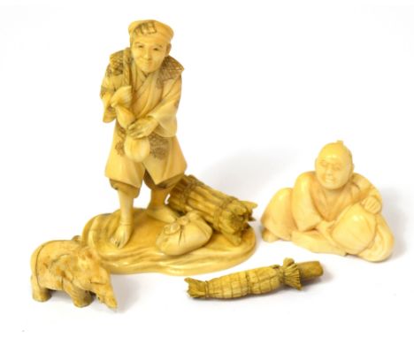A small Japanese Meiji period carved ivory okimono on naturalistic base, base bears two red character marks to underside, hei