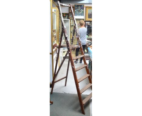 A large vintage ladder, height 203cm.