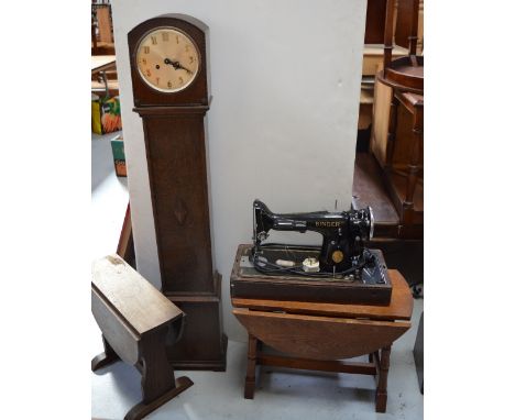 An oak cased eight day grandmother clock, two small oak dropleaf tables and an oak cased Singer table sewing machine (4).