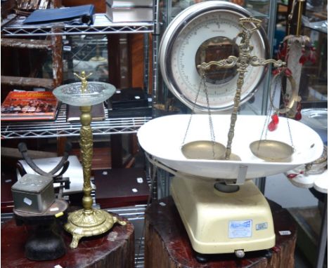 A large set of Weighmaster scales, a smaller set of scales with brass weights, a further set of ornate brass scales and furth