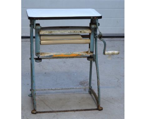 An early 20th century blue painted mangle with white enamel top.