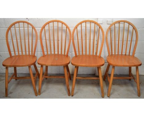 A set of four Ercol style stick back dining chairs (4).