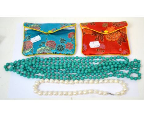 An opera length turquoise bead necklace, approx 125cm and a heavy cultured pearl necklace with a .925 silver clasp, length ap