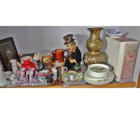 Shelf of assorted china, pottery, a tin-plate drunk with lamp post and an Oriental brass vase