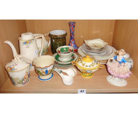 Shelf of assorted china